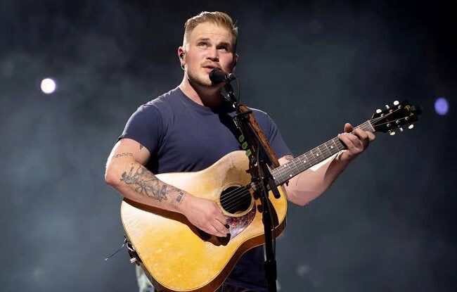 Zach Bryan Sings About ‘Holding His Tongue’ as He Teases New Music